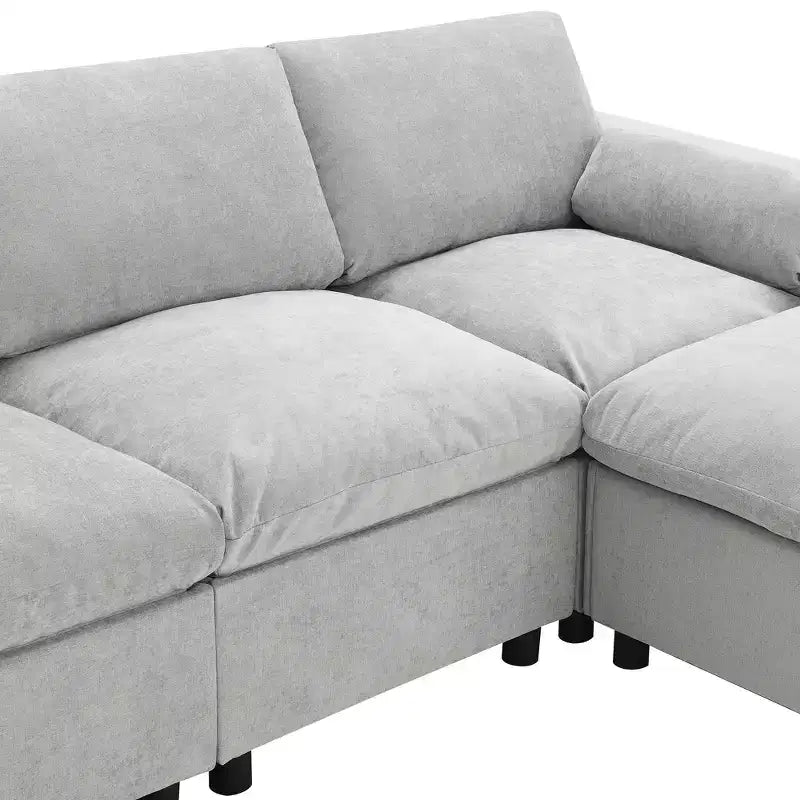 Canapé d'angle modulable 5 places Polibi en chenille avec deux poufs