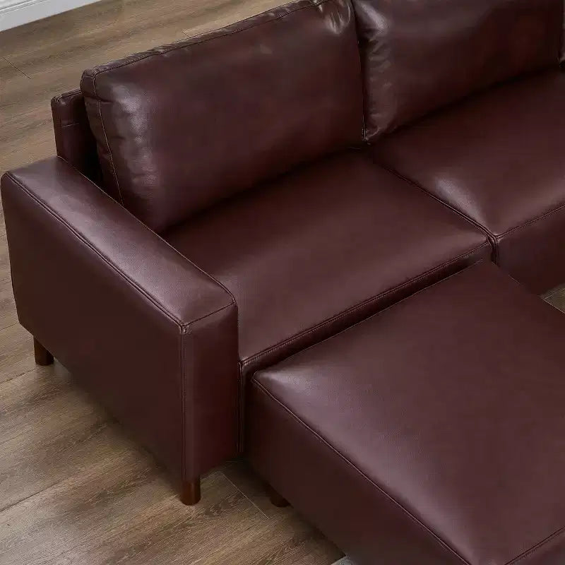 GDFStudio Darcy 104 Canapé sectionnel moderne 5 places en similicuir avec pouf