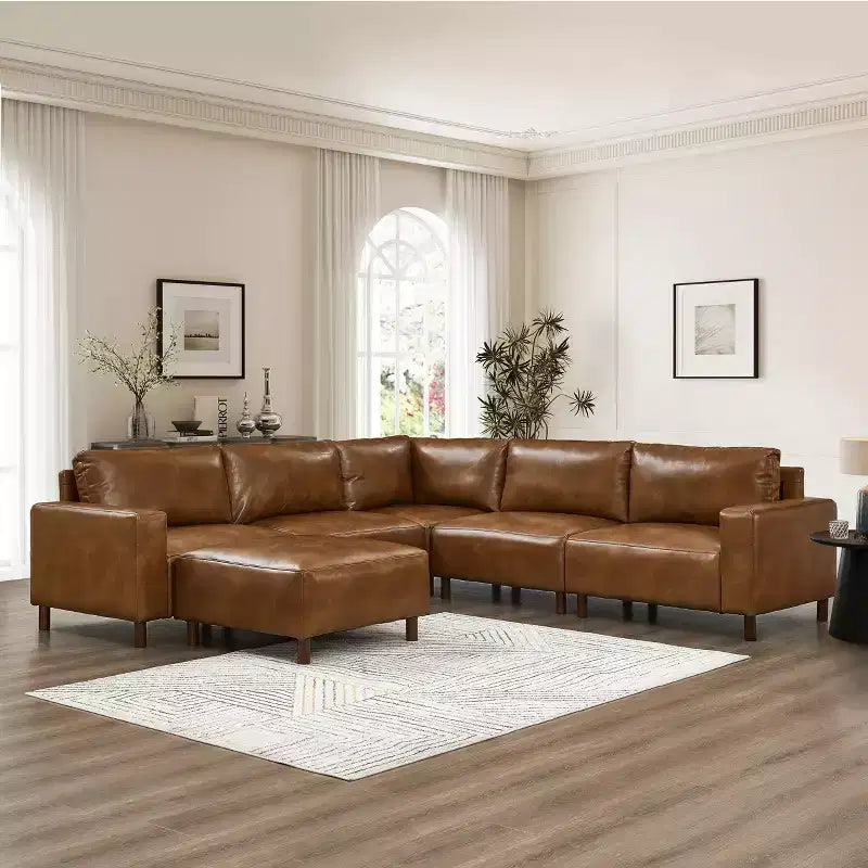 GDFStudio Darcy 104 Canapé sectionnel moderne 5 places en similicuir avec pouf