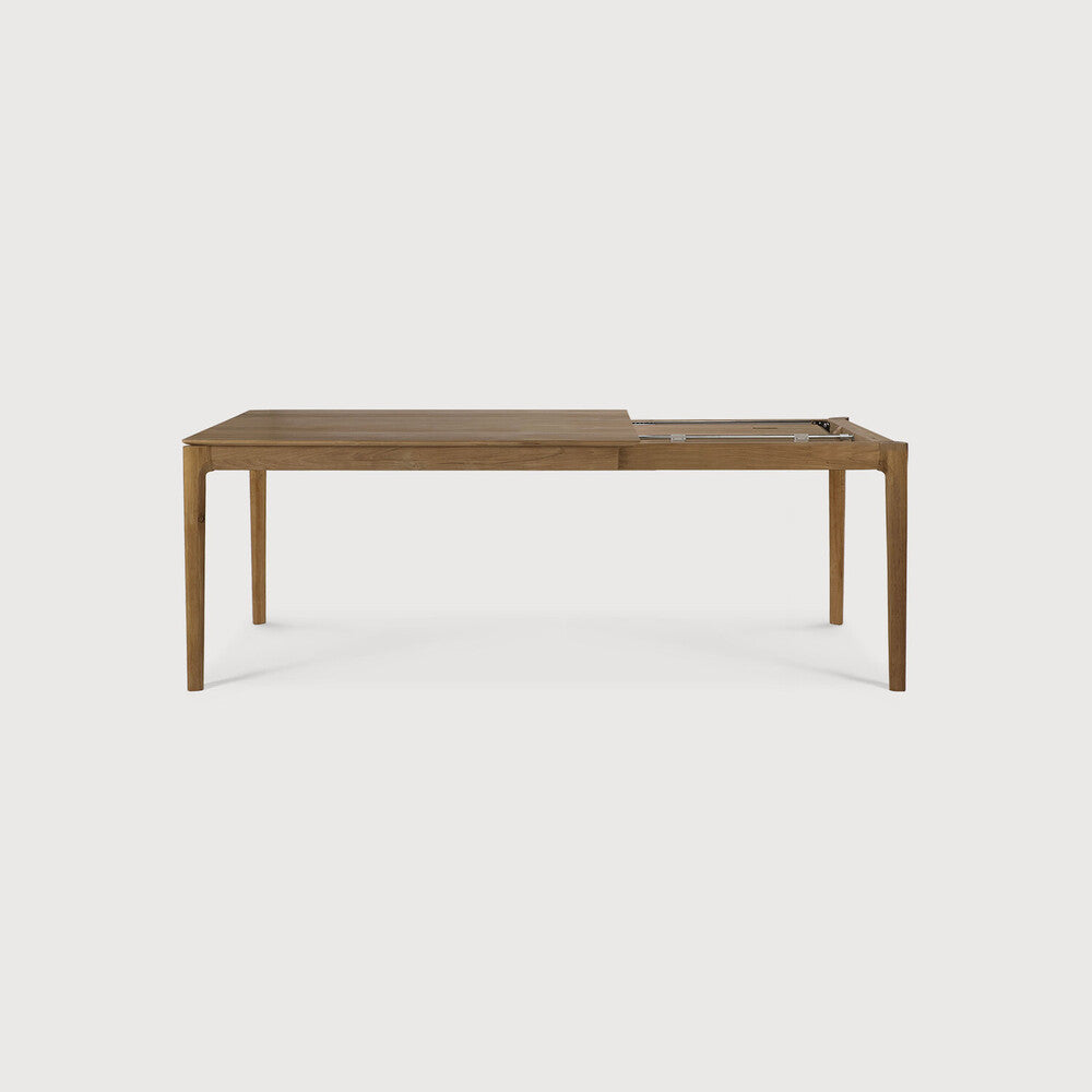 Table à manger extensible contemporaine en chêne massif avec plateau rectangulaire et piètement ajouré pour salle à manger