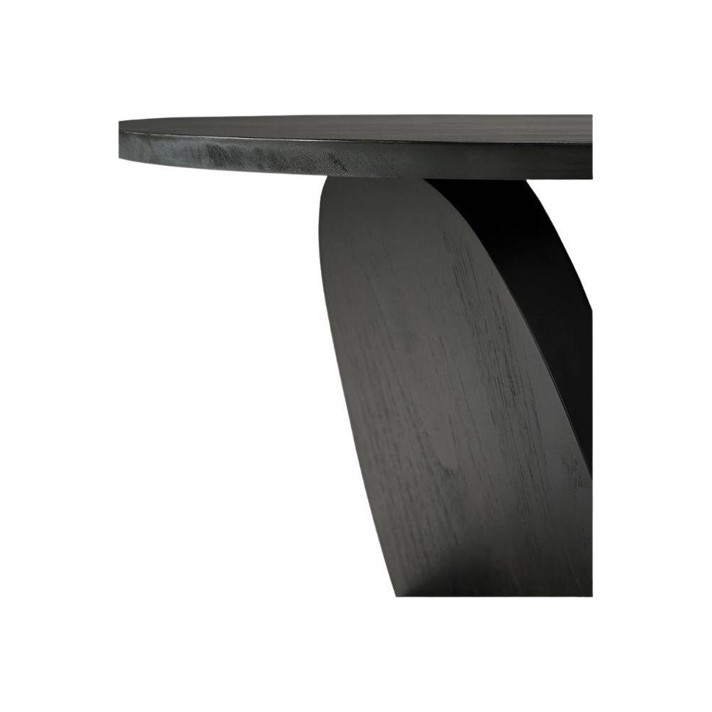 Table d'appoint sculpturale en teck massif avec plateau rond et piètement dynamique à espace négatif pour salon