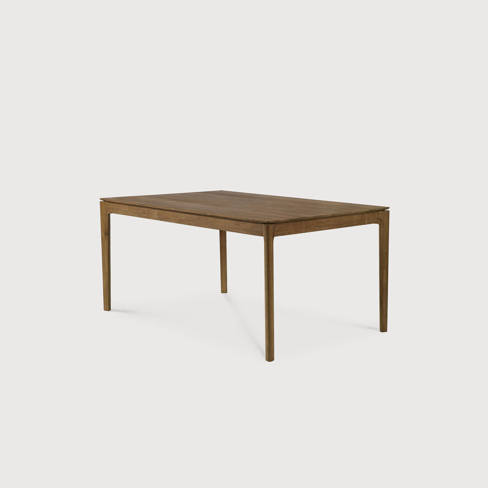 Table à manger extensible contemporaine en chêne massif avec plateau rectangulaire et piètement ajouré pour salle à manger