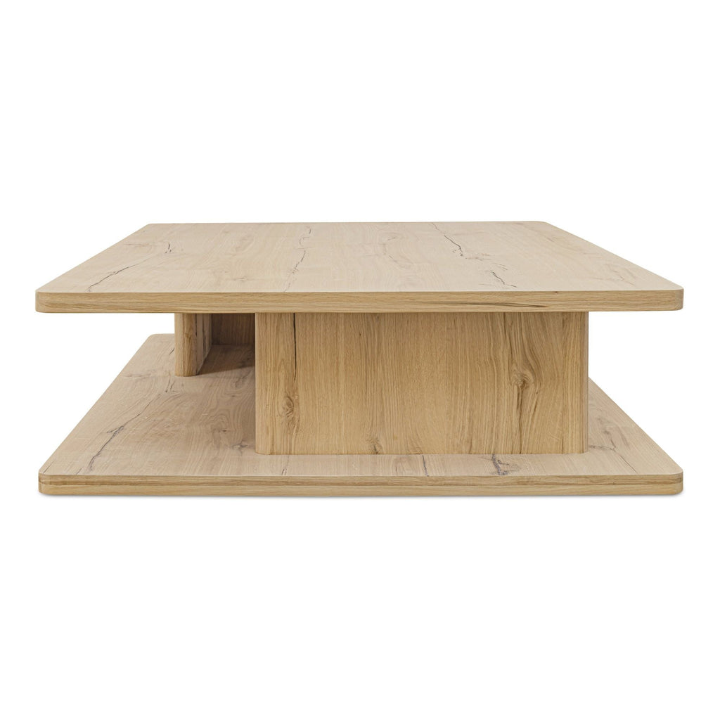 Table basse moderne en chêne massif avec plateau rond à rainure en V et piètement entretoisé en croisillon pour salon