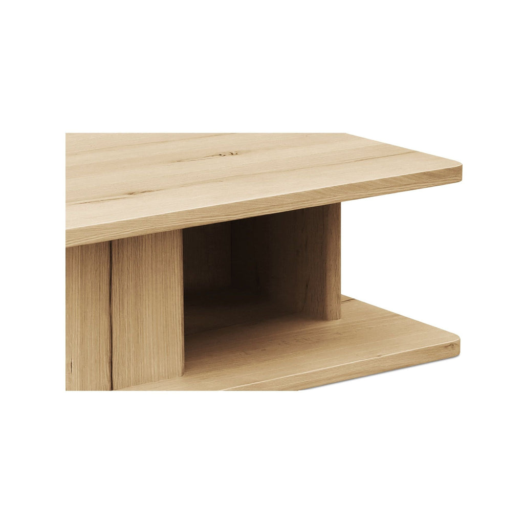 Table basse moderne en chêne massif avec plateau rond à rainure en V et piètement entretoisé en croisillon pour salon