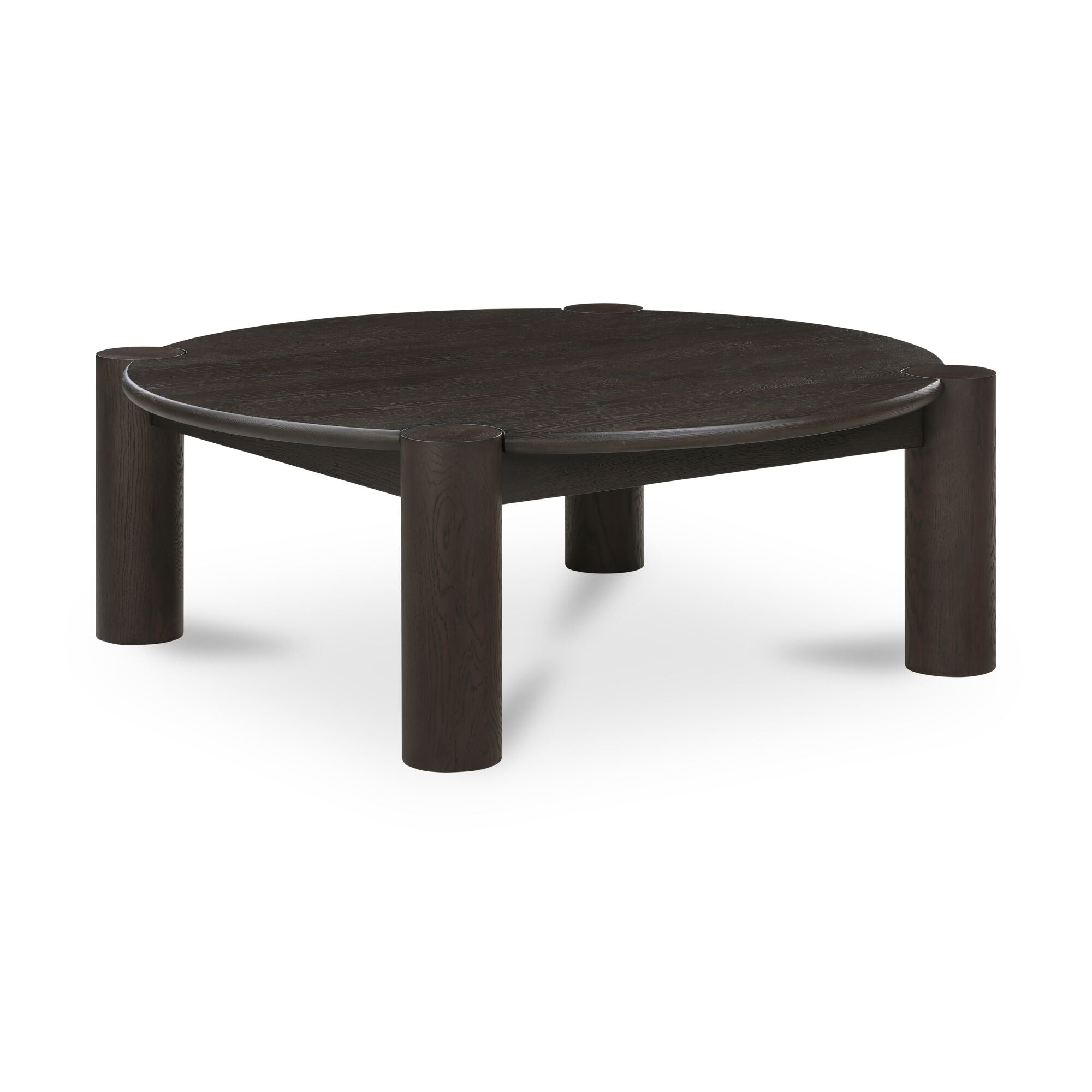 Table basse organique moderne en chêne massif avec plateau rond à bord arrondi et pieds colonne pour salon