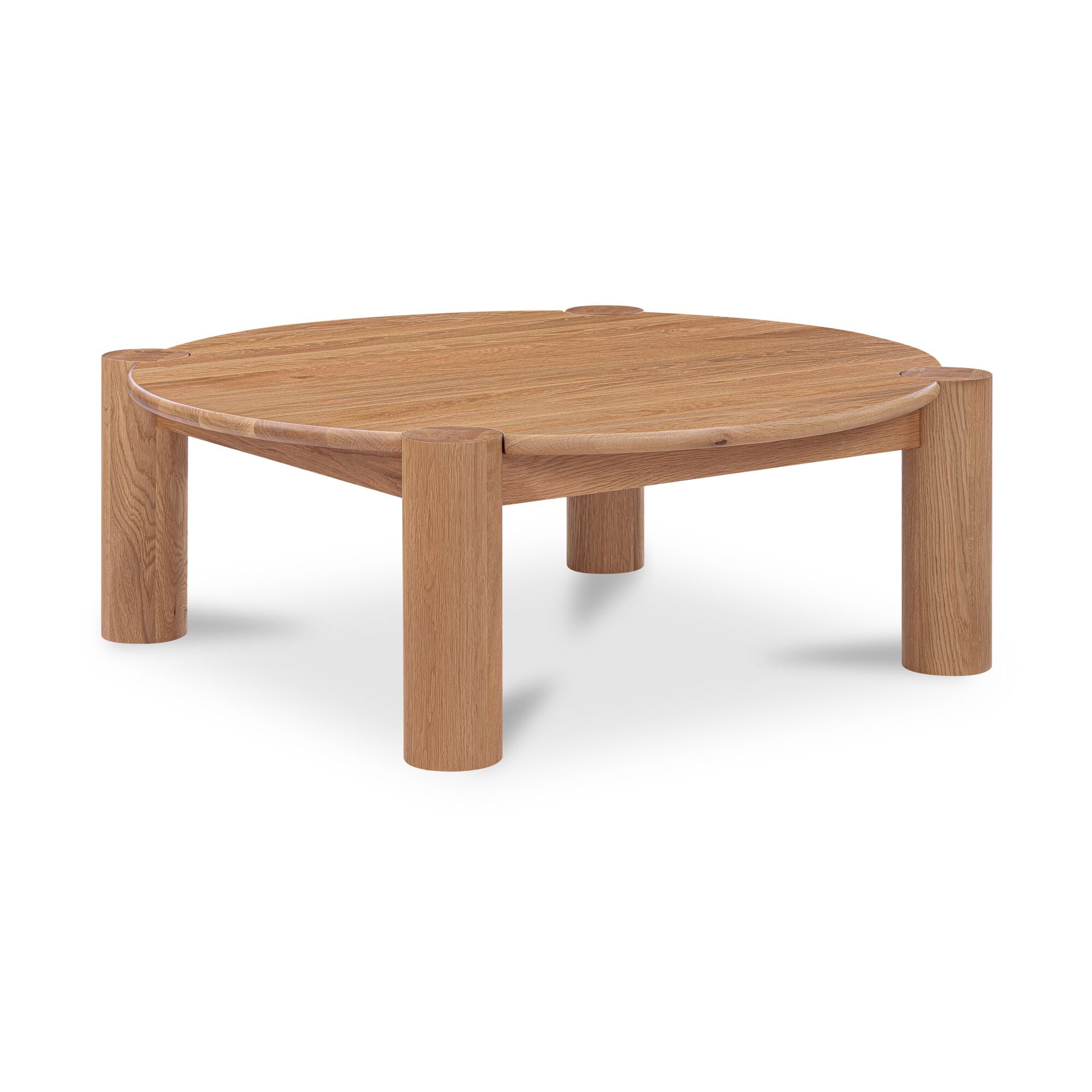 Table basse organique moderne en chêne massif avec plateau rond à bord arrondi et pieds colonne pour salon