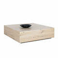 Table basse moderne en chêne massif avec plateau carré blanchi et cadre minimaliste pour salon