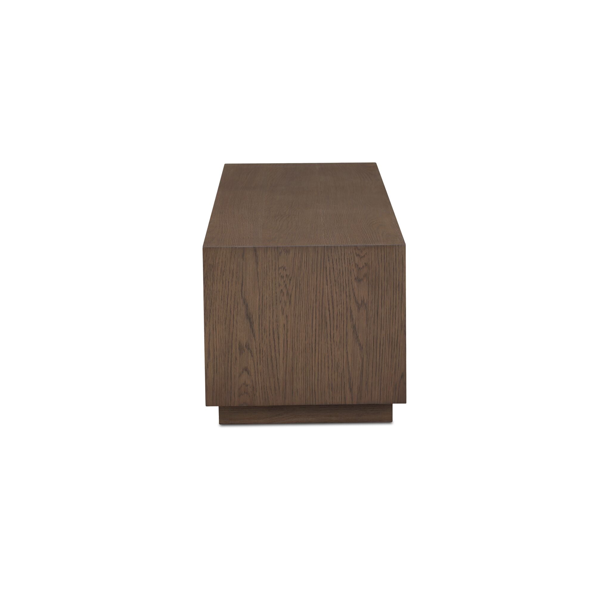Table basse minimaliste en chêne avec plateau rectangulaire étroit et base en retrait pour salon