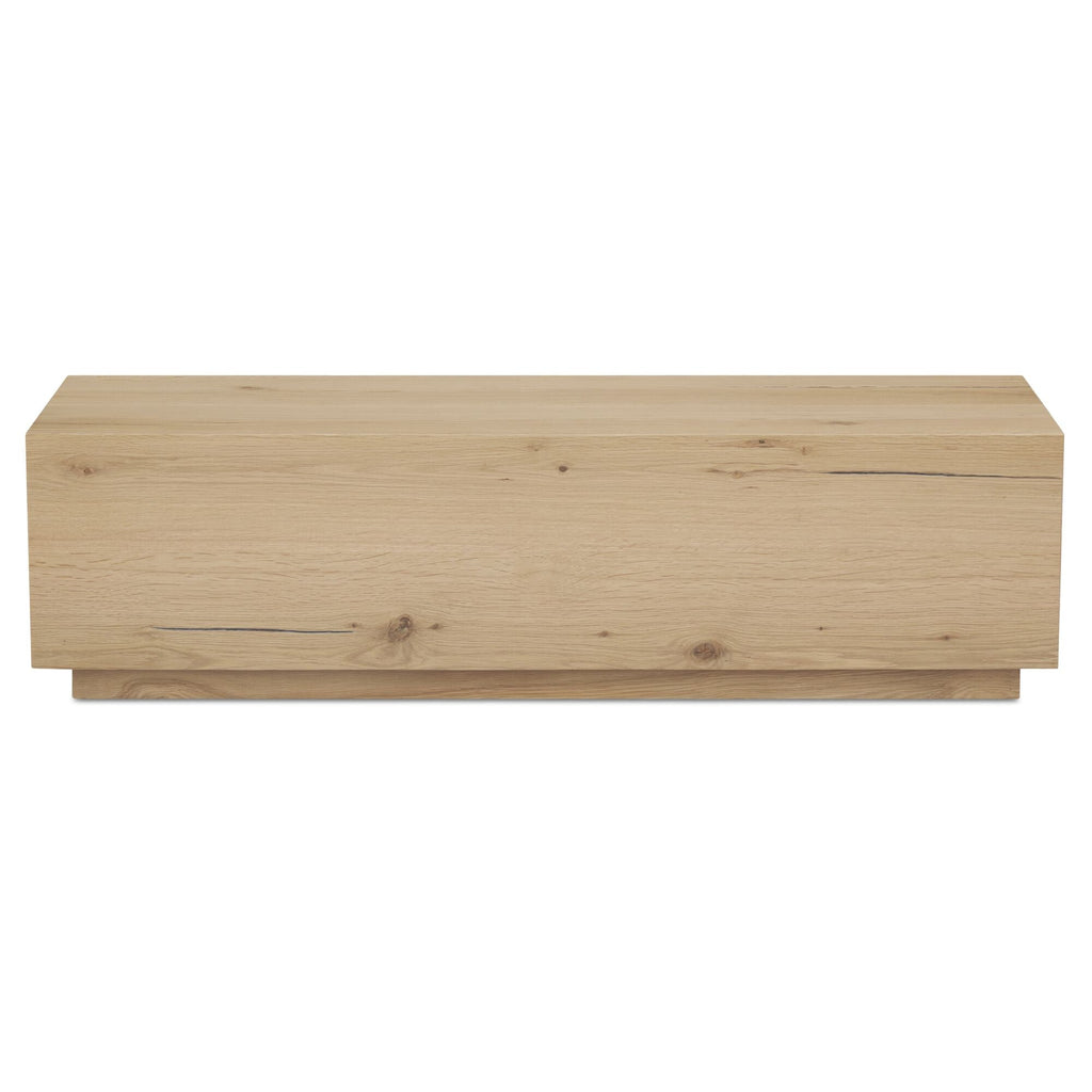 Table basse minimaliste en chêne avec plateau rectangulaire étroit et base en retrait pour salon