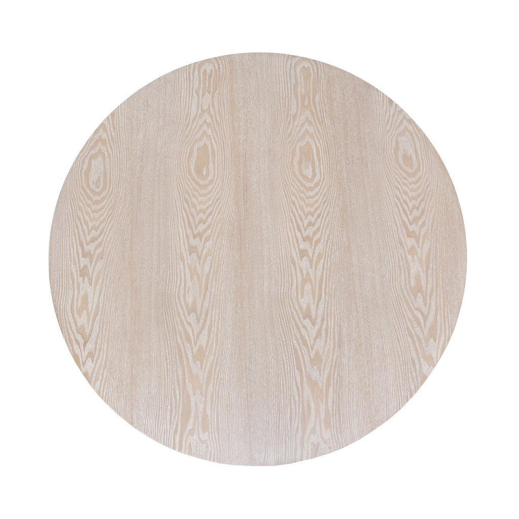 Table basse scandinave en chêne cérusé avec plateau rond épais et piètement en croix pour le salon