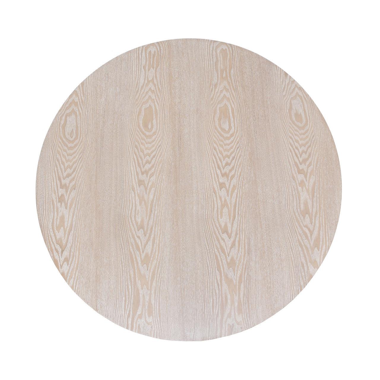 Table basse scandinave en chêne cérusé avec plateau rond épais et piètement en croix pour le salon