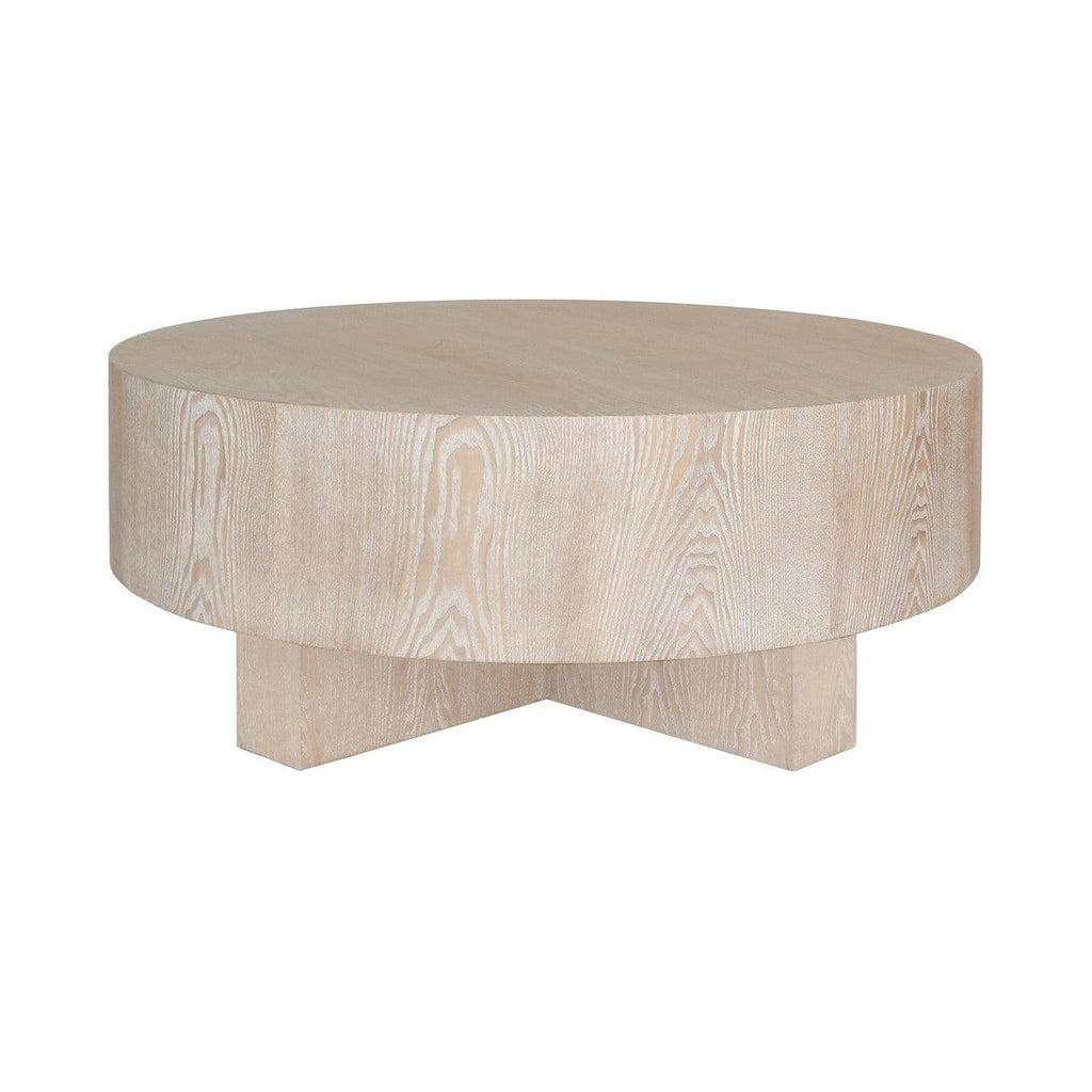 Table basse scandinave en chêne cérusé avec plateau rond épais et piètement en croix pour le salon