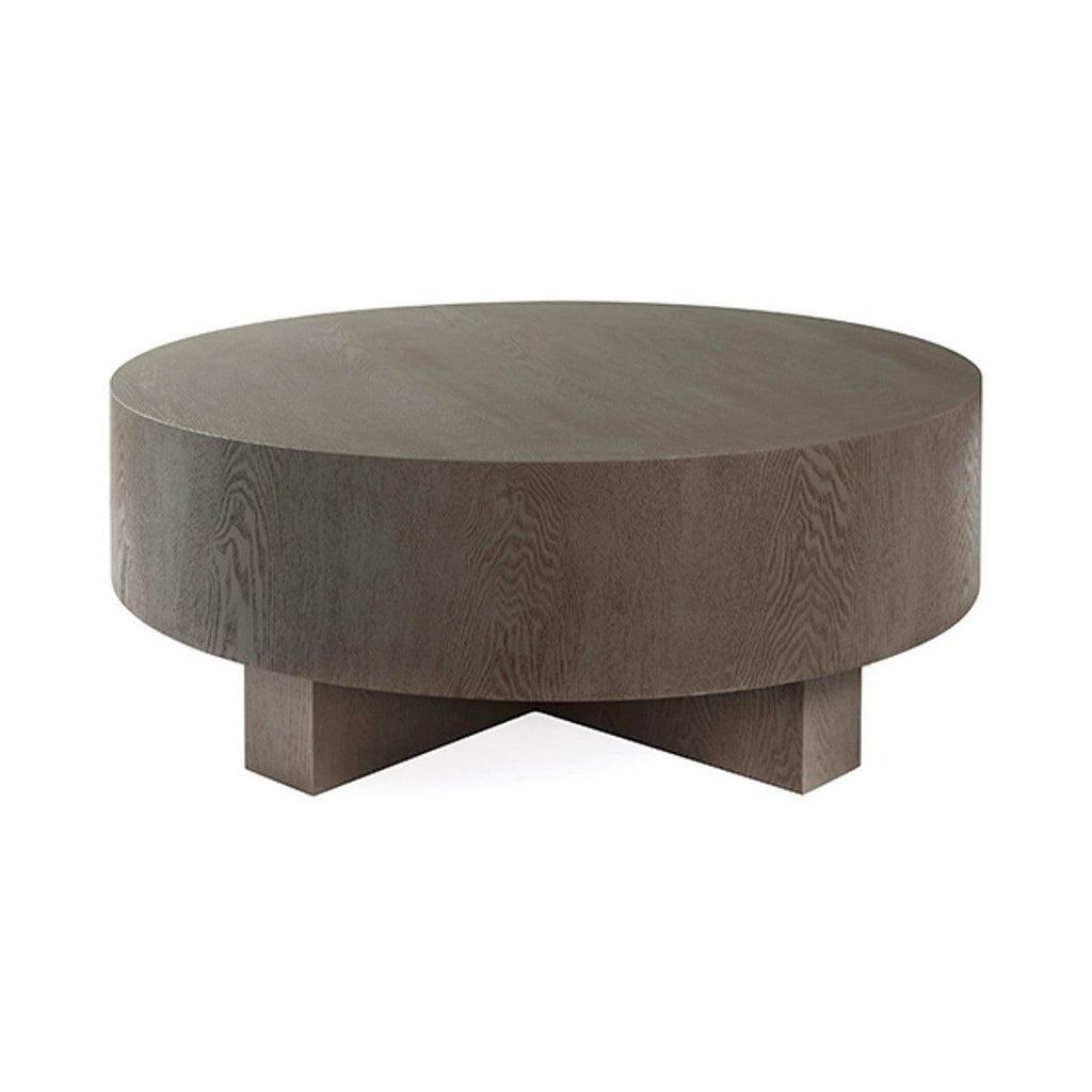 Table basse scandinave en chêne cérusé avec plateau rond épais et piètement en croix pour le salon