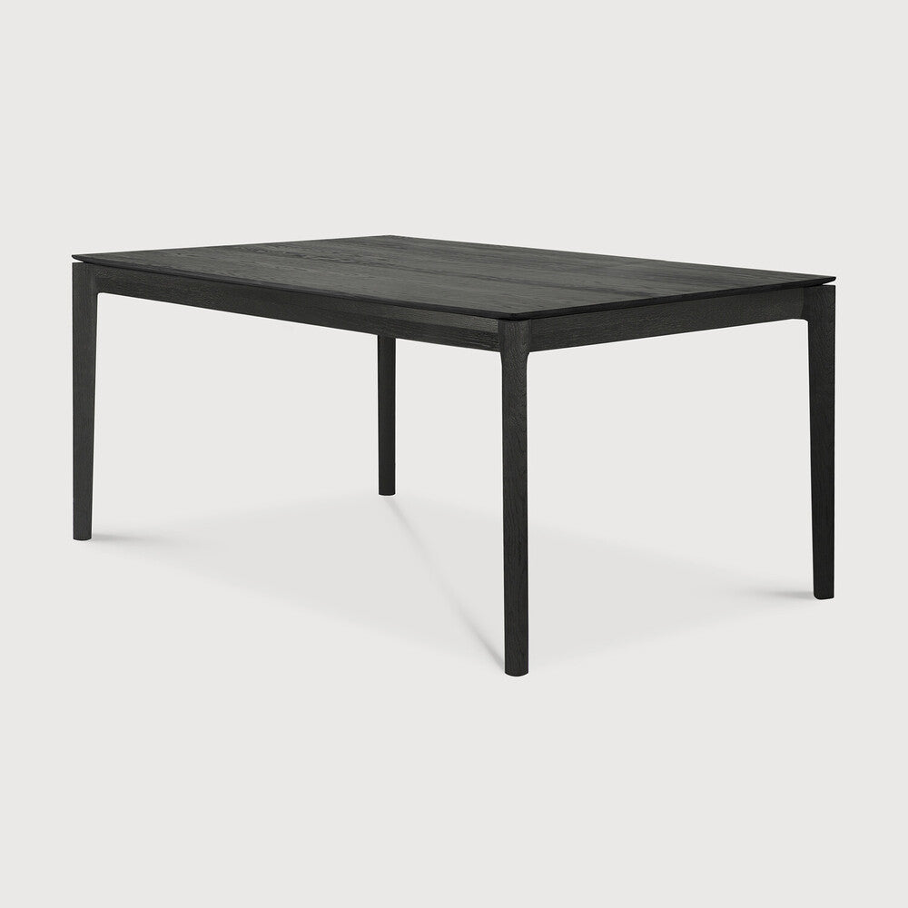 Table à manger extensible contemporaine en chêne massif avec plateau rectangulaire et piètement ajouré pour salle à manger