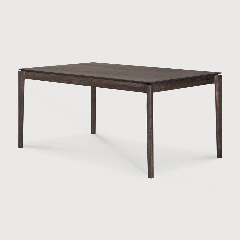 Table à manger extensible contemporaine en chêne massif avec plateau rectangulaire et piètement ajouré pour salle à manger