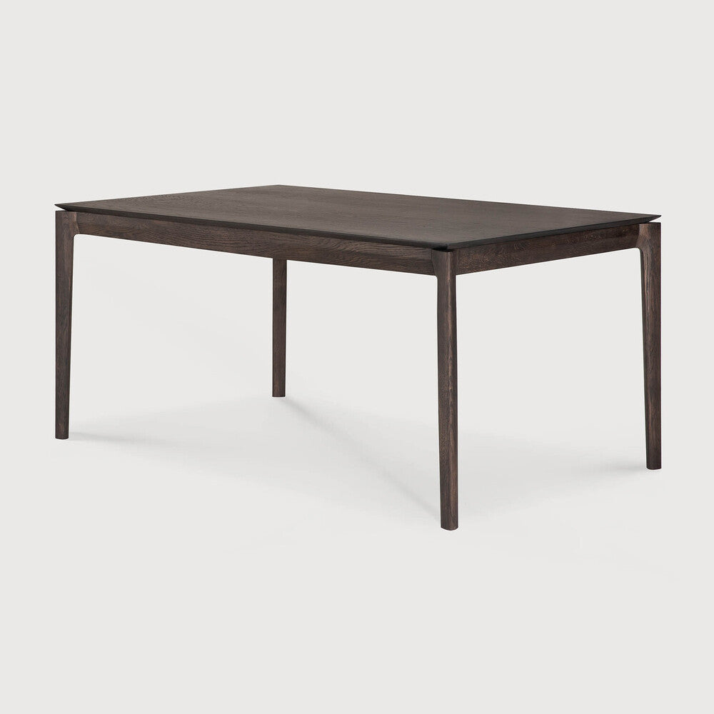 Table à manger extensible contemporaine en chêne massif avec plateau rectangulaire et piètement ajouré pour salle à manger