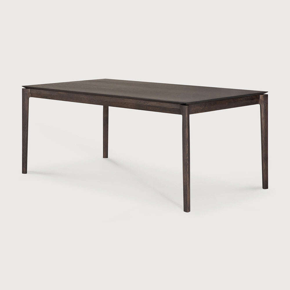 Table à manger extensible contemporaine en chêne massif avec plateau rectangulaire et piètement ajouré pour salle à manger